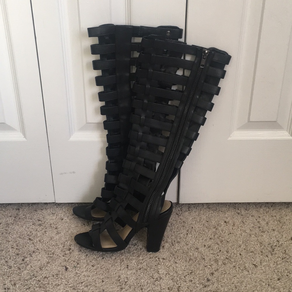 Tall black heeled gladiator sandals